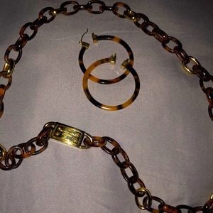 Matching Mk necklace and earrings set.